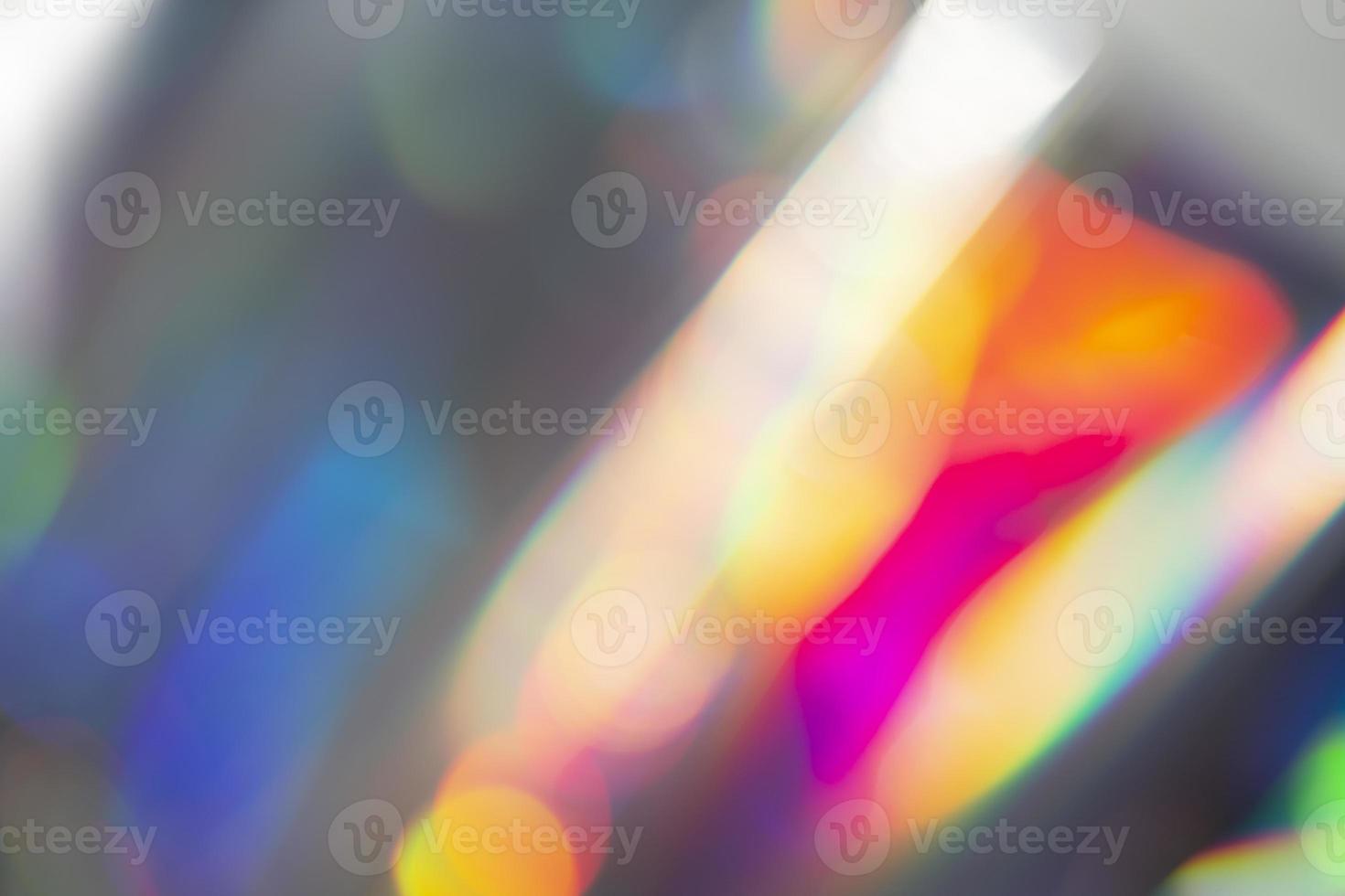 Rainbow holographic bokeh background. Multicolored overflows of color. photo