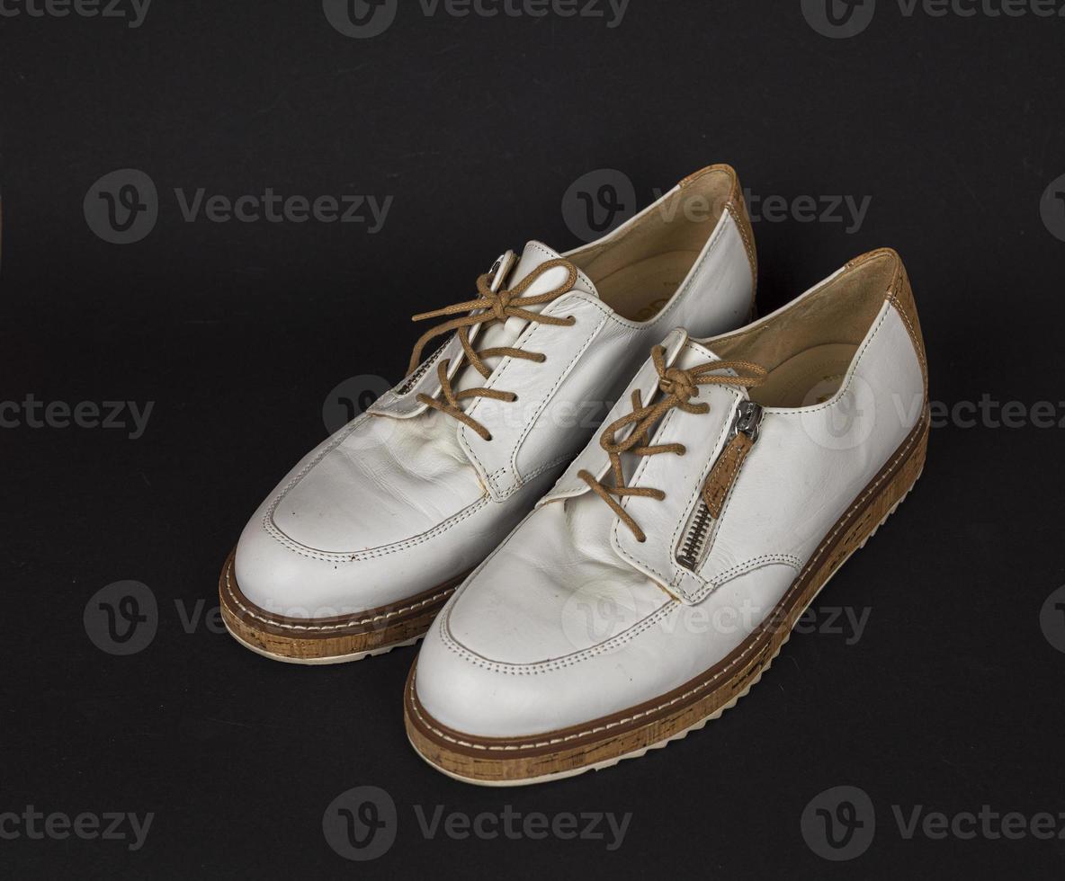 White shoes with cork soles and brown laces. many parts with different angles. new2 photo
