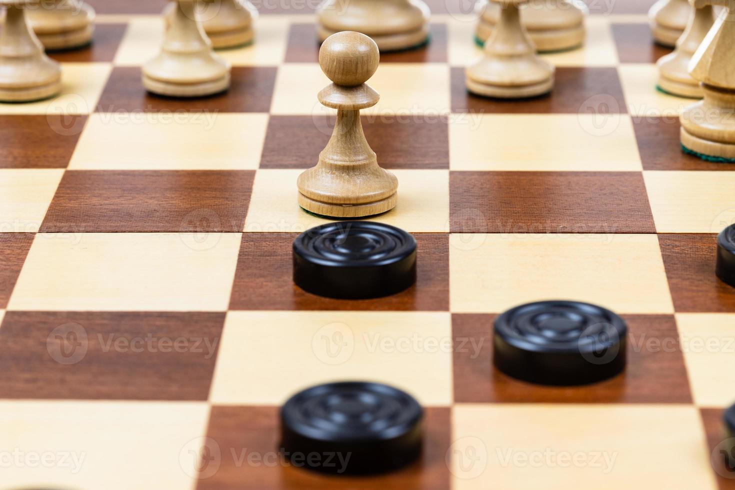 pawn and checkers piece in center of playfield 19830068 Stock Photo at