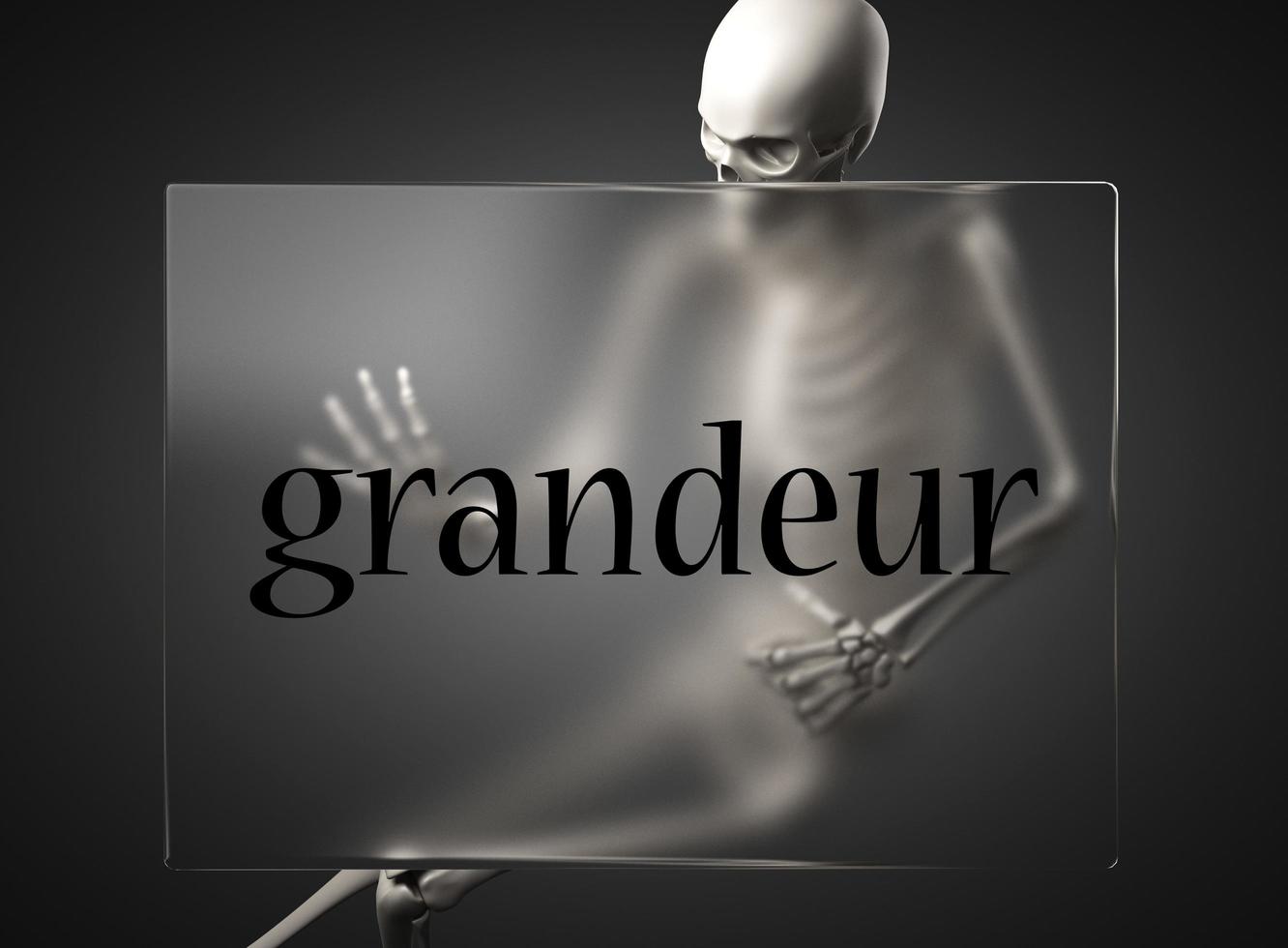 grandeur word on glass and skeleton photo