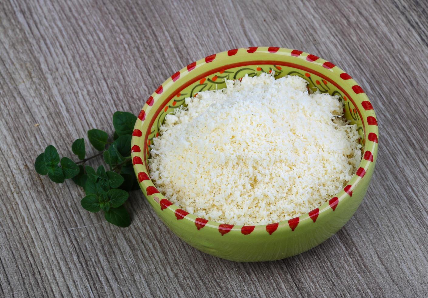 Shredded parmesan dish view photo