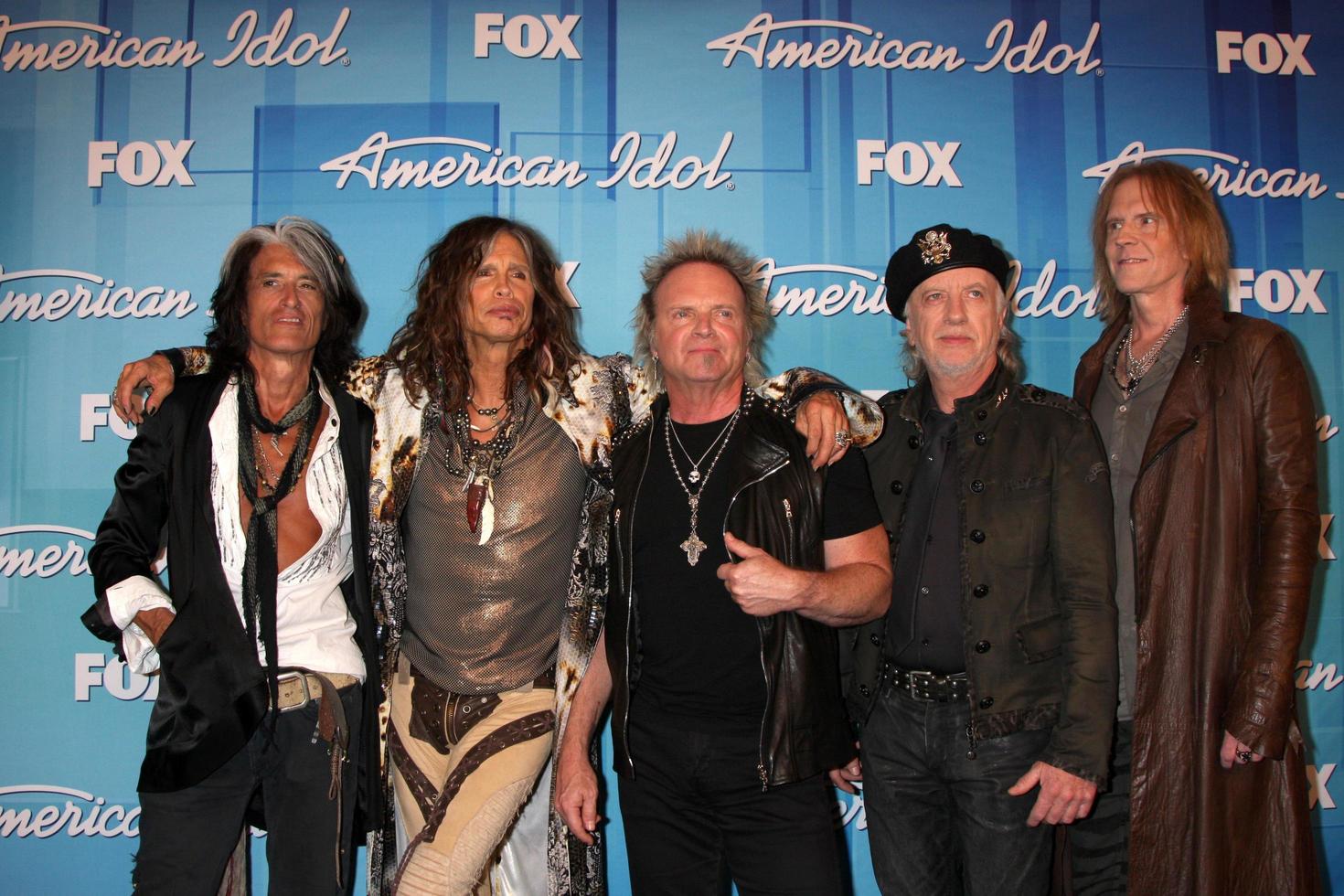 LOS ANGELES  MAY 23 - Aerosmith   L R  Musicians Joe Perry, Steven Tyler, Joey Kramer, Brad Whitford, and Tom Hamilton in the Press Room of the American Idol 2012 Finale at Nokia Theater on May 23, 2012 in Los Angeles, CA photo