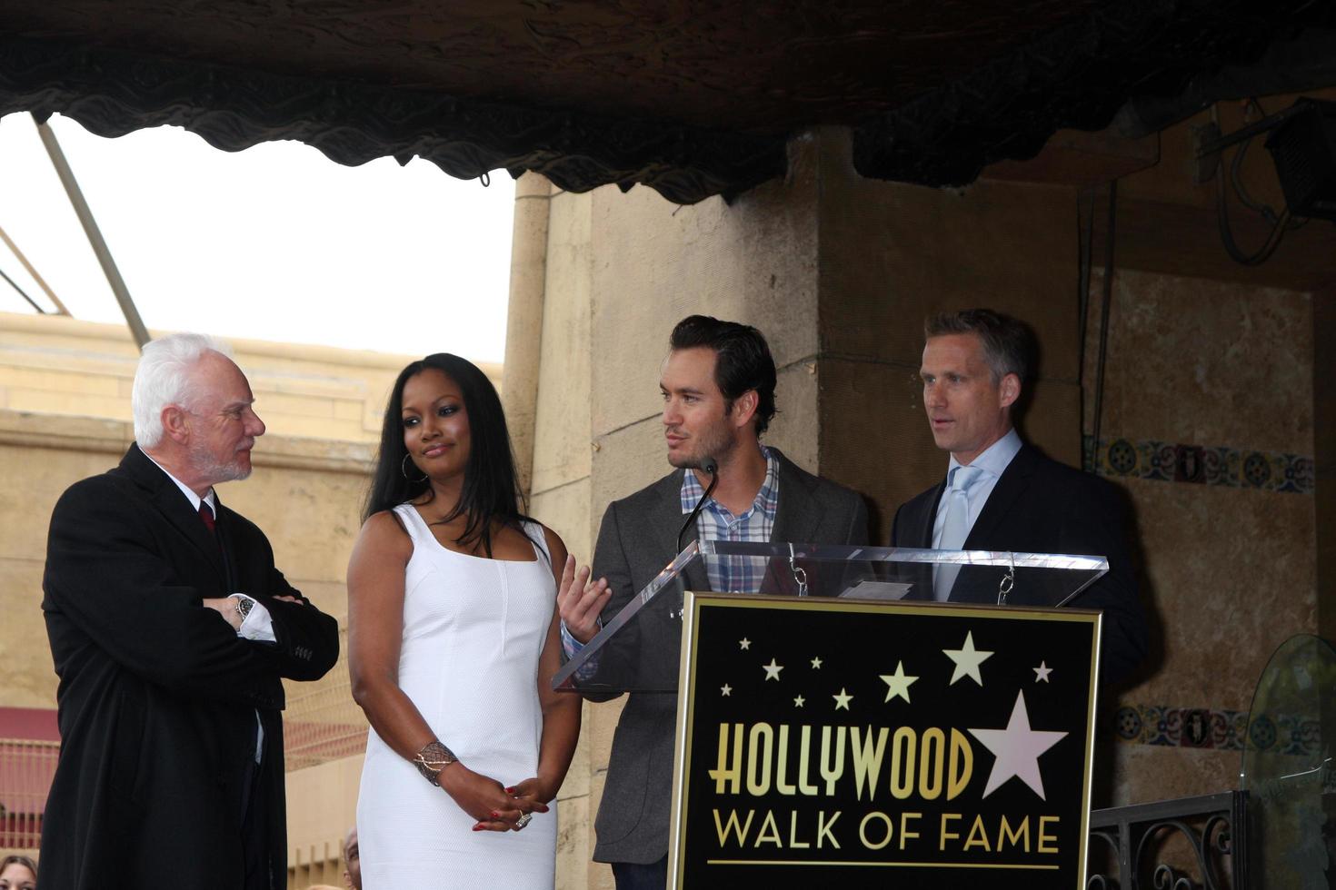 LOS ANGELES, MAR 16 - Malcolm McDowell, Garcelle Beauvais, Mark-Paul Gosselaar, Reed Diamond at the Malcolm McDowell Walk of Fame Star Ceremony for The Muppets at the Hollywood Boulevard on March 16, 2012 in Los Angeles, CA photo