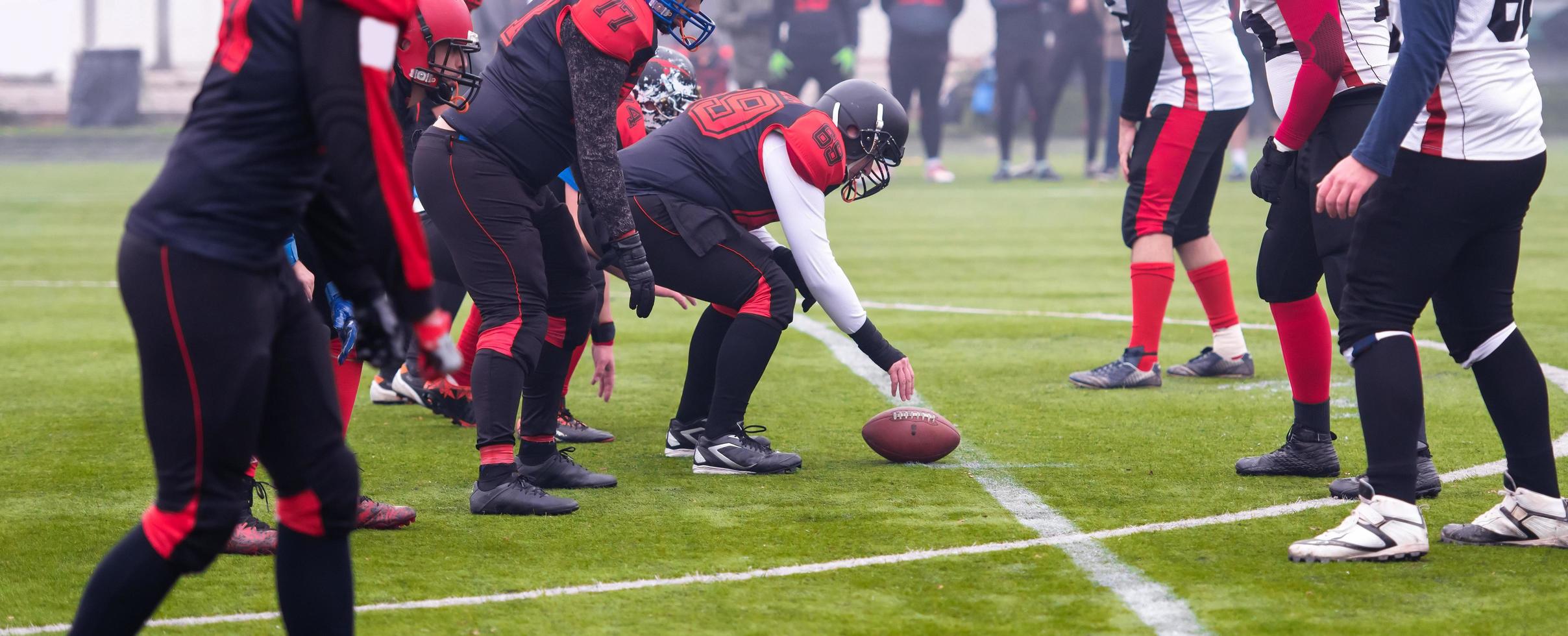 professional american football players ready to start photo