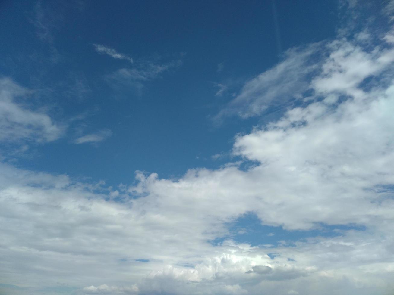 clear sky view with white clouds photo