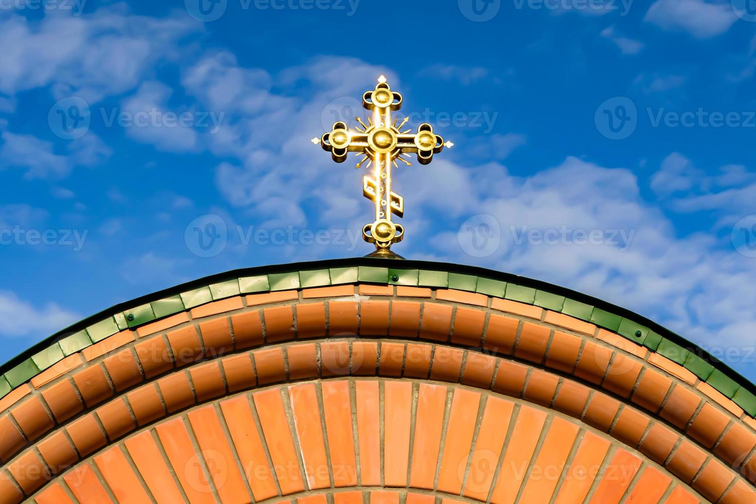 Christian church cross in high steeple tower for prayer photo