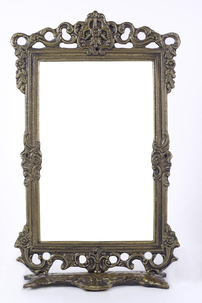 Antique blank photo frame with white interior