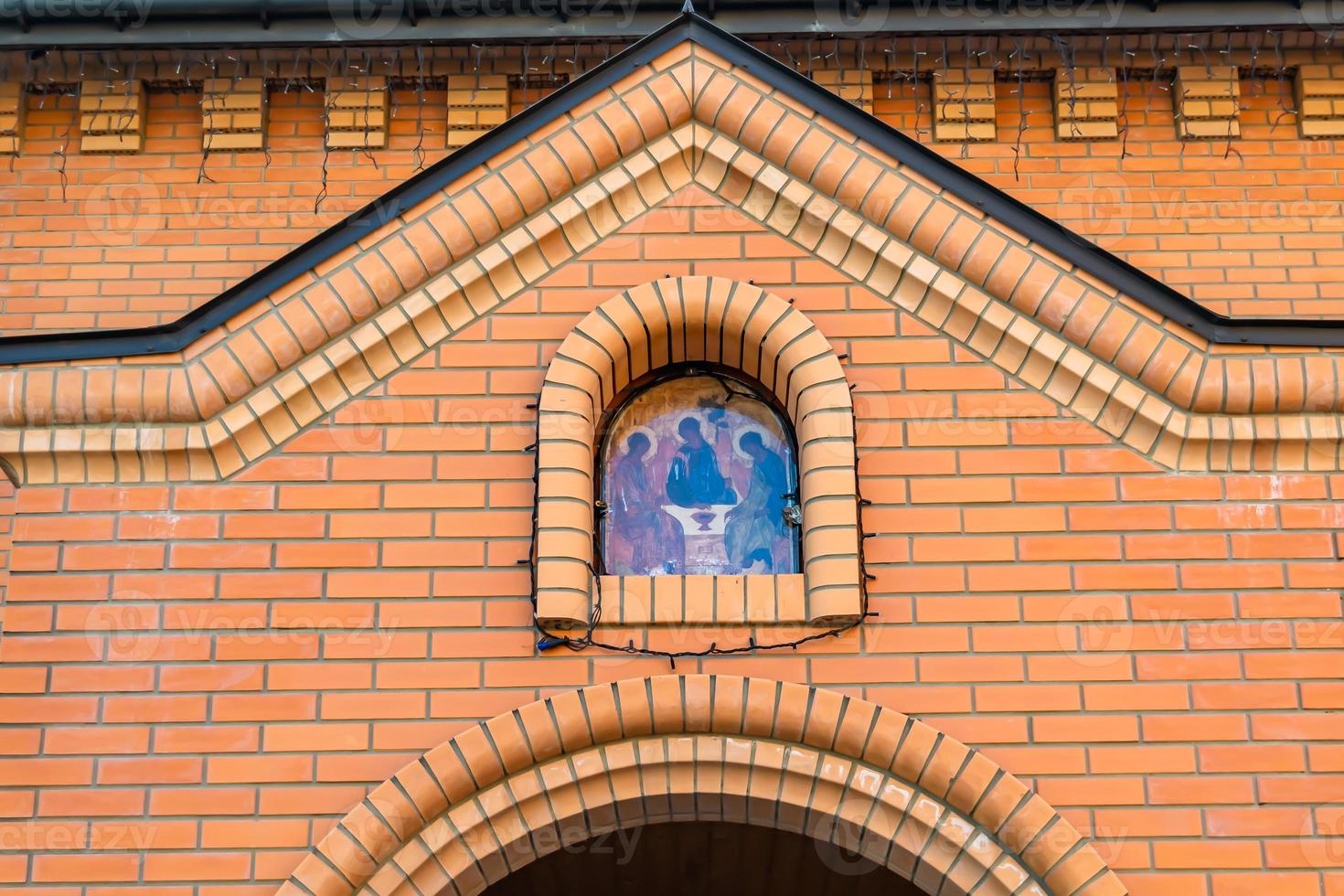 Christian church cross in high steeple tower for prayer photo