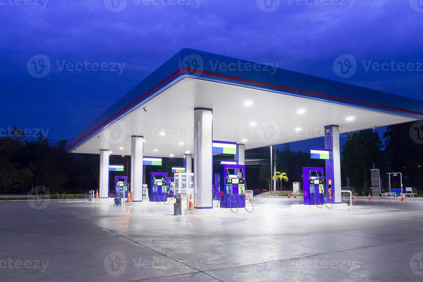 Gas station at night time photo