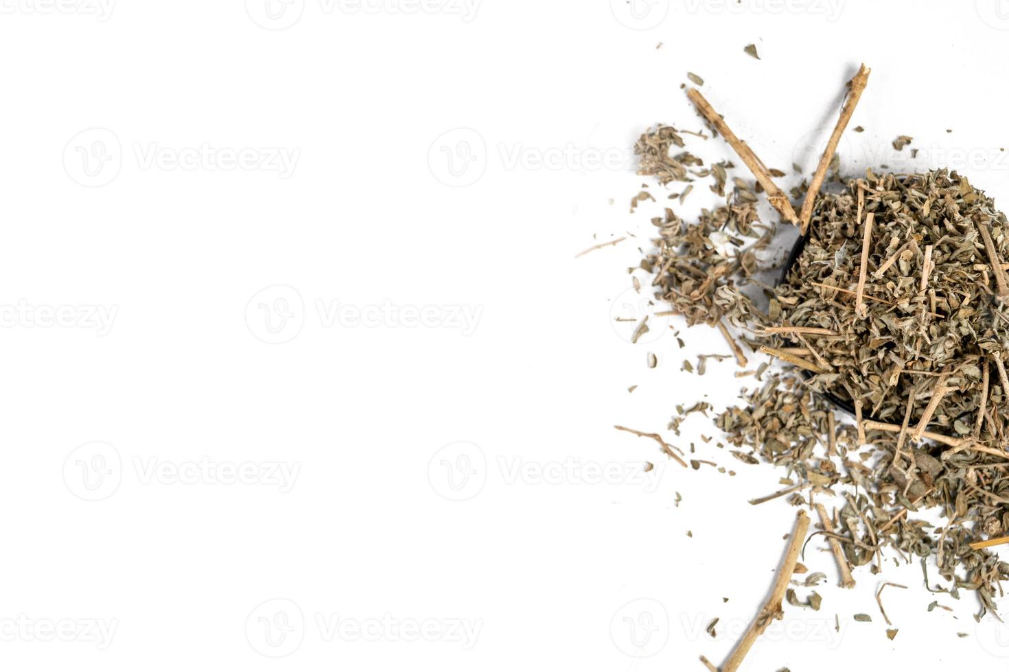 Chinese herbal medicine Tribulus terrestris or gohru on White background photo