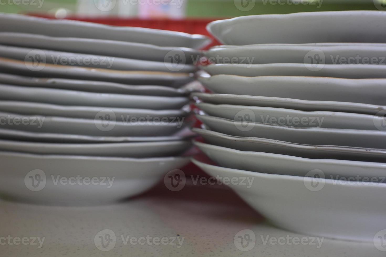 a pile of plates that are neatly arranged and attractive photo