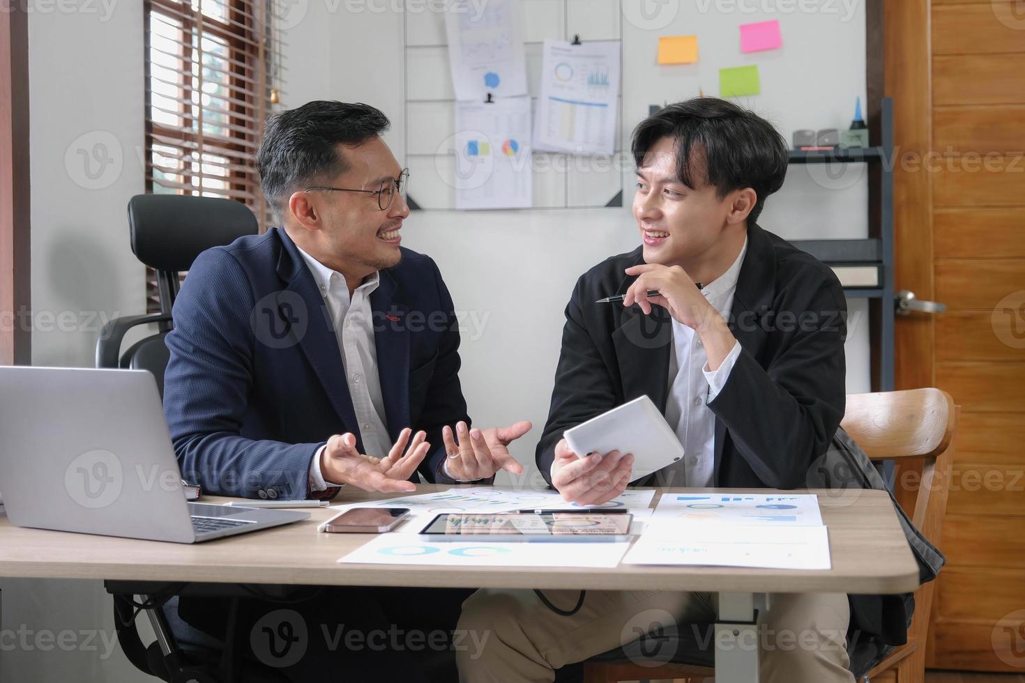 Two Business working at office with documents on desk, meeting to planning analyzing the financial report, business plan investment, finance analysis concept photo
