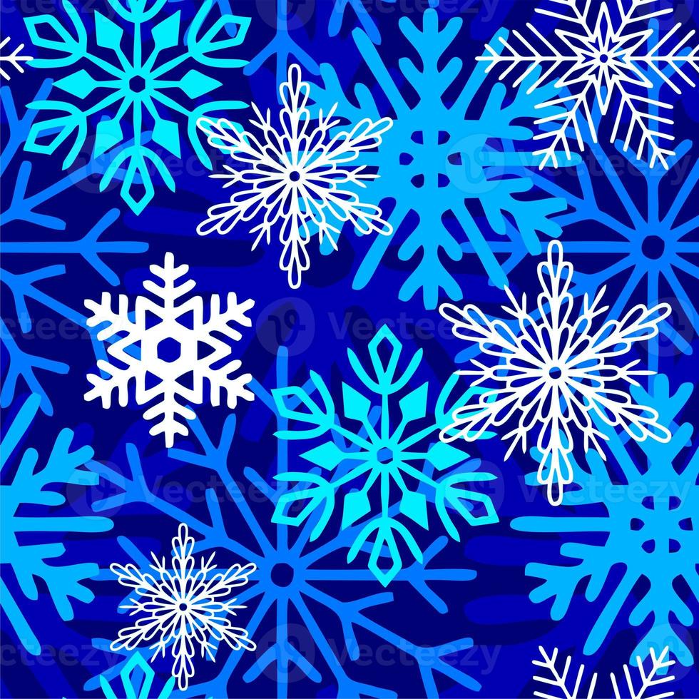 seamless asymmetric pattern of multicolored snowflakes on a blue background, texture, design photo