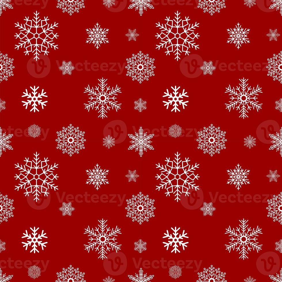 winter seamless pattern of snowflakes, white continuous pattern on red background photo