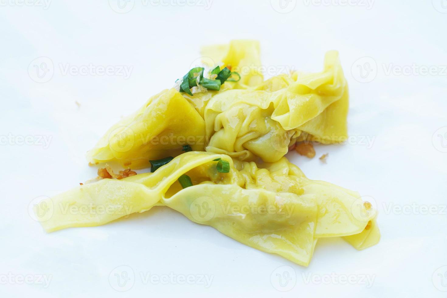 Yellow dumpling. Stuffed with minced pork . Concept,   Traditional food. Appetizer for a party or serve as main dish. Delicious and healthy food photo