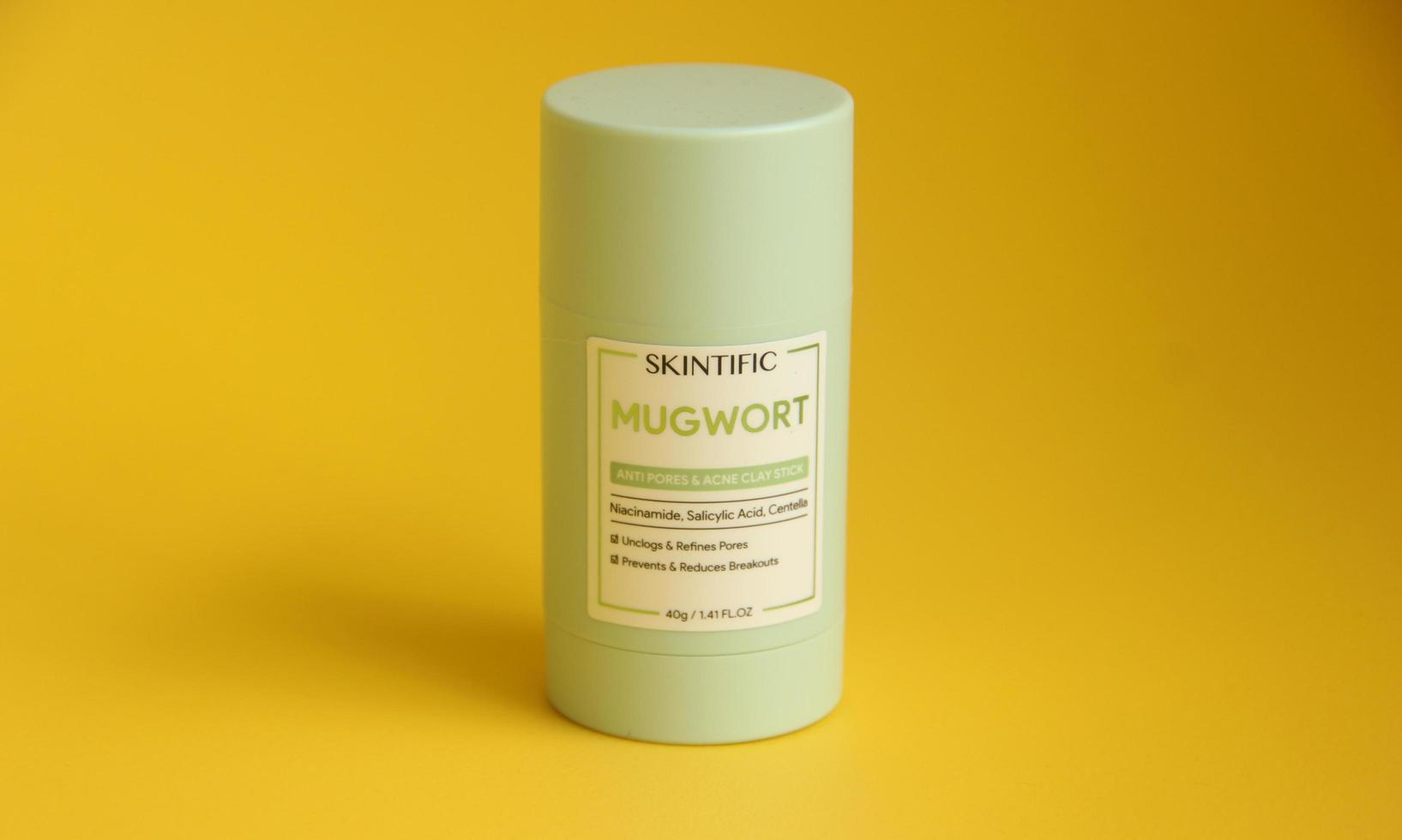 West Jakarta, Indonesia - February 10th, 2023 - Skintific mugwort clay mask stick for anti acne prevention with salicylic acid in small covinient plastic container. Beauty skin care product. photo