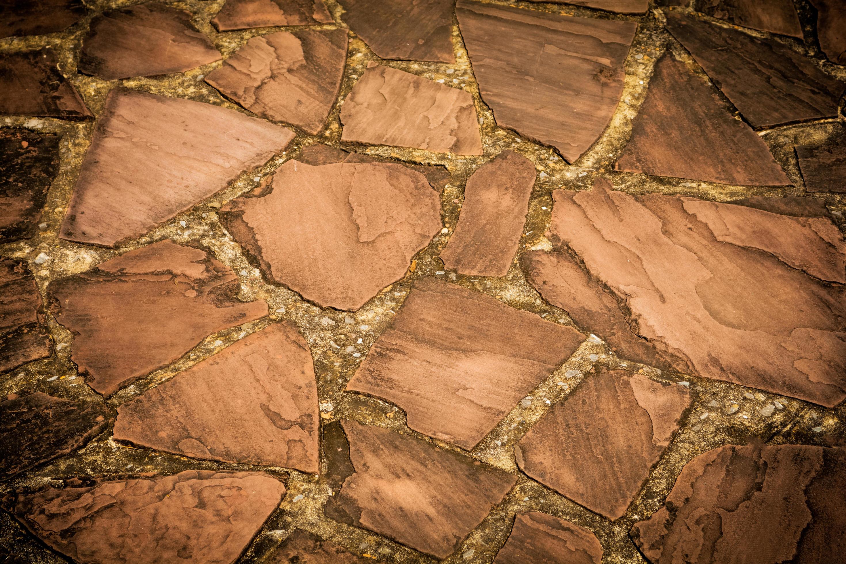 Stone floor texture background from natural stones vintage color