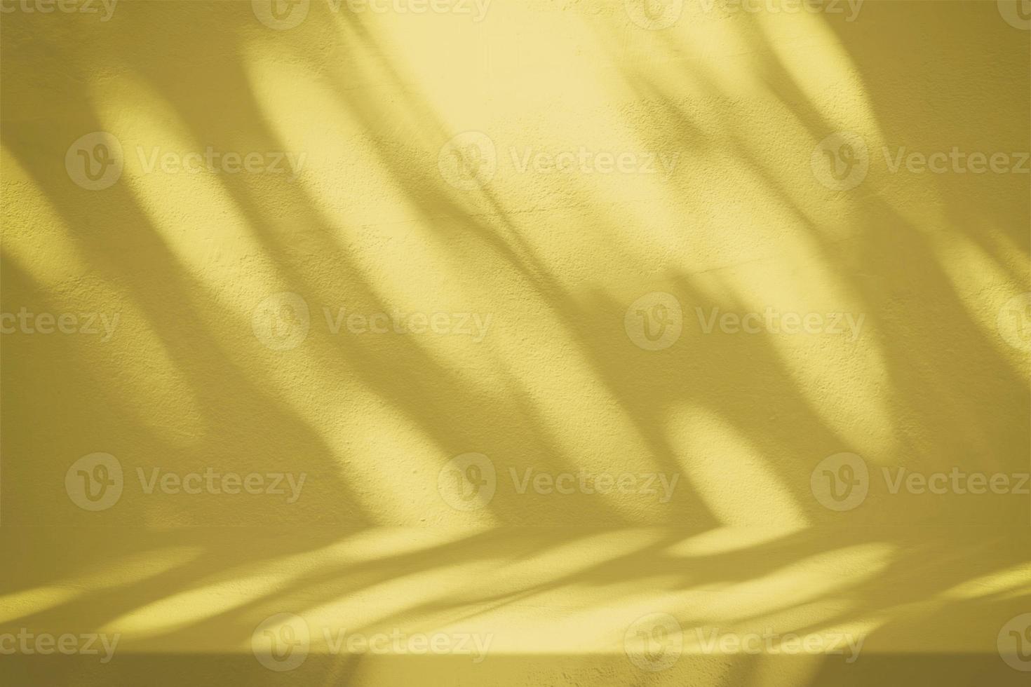 Bold Gold Color Stucco Table with Nature Shadow on Concrete Wall Texture Background, Suitable for Cosmetic Product Presentation Backdrop, Display, and Mock up. photo