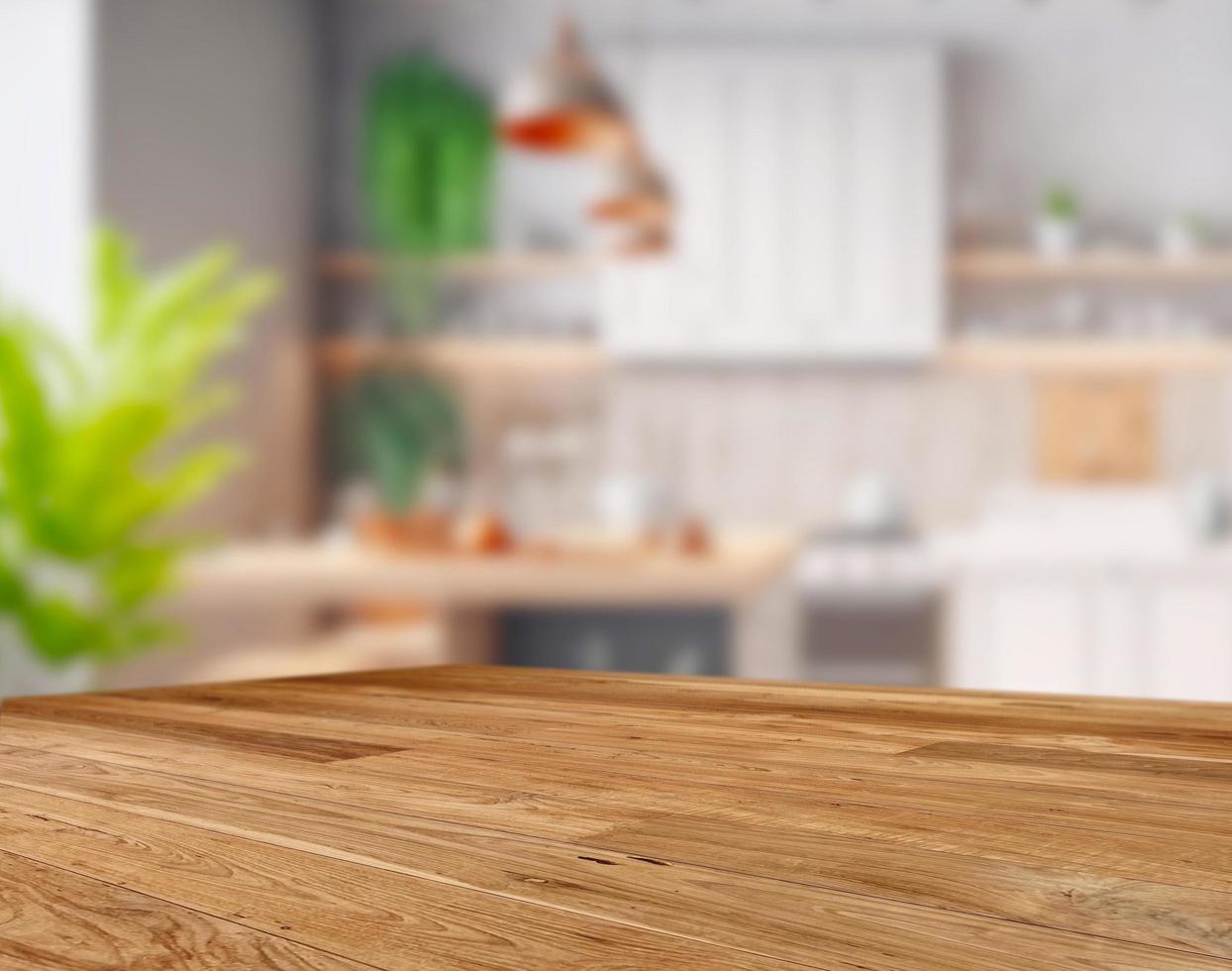 Wood table top on blurred kitchen background photo