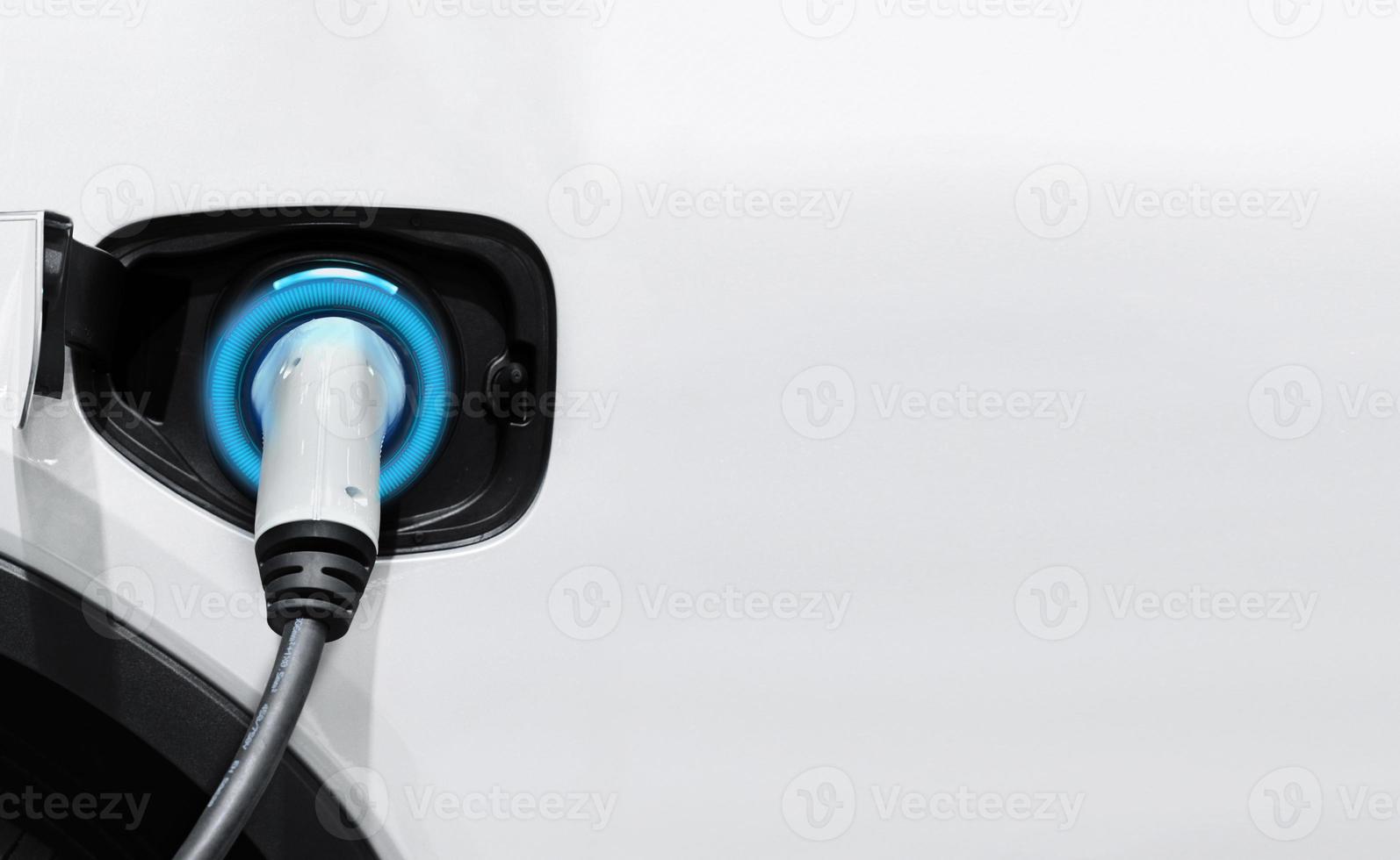 Electrical car charger, White electric car charging with copy space, Technology electric vehicle concept photo