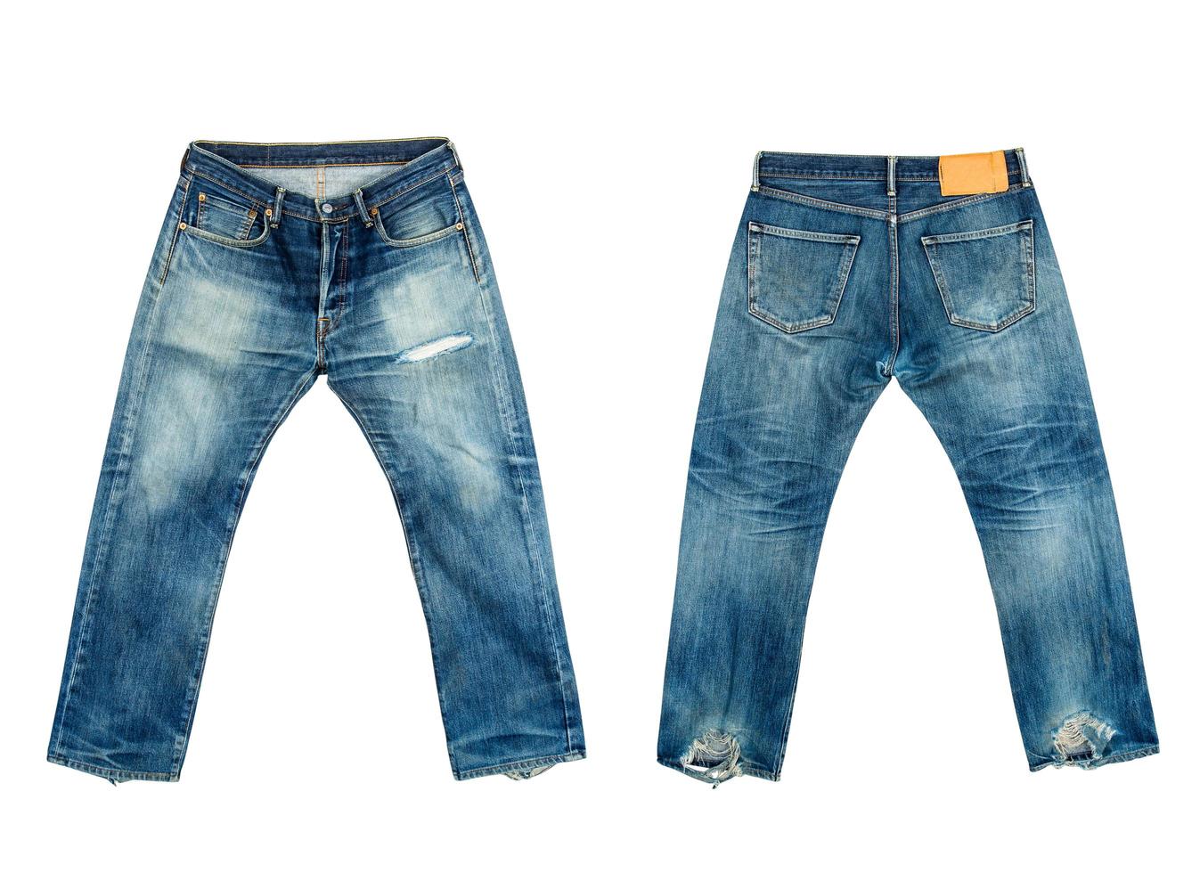 Old jeans on isolated white background photo
