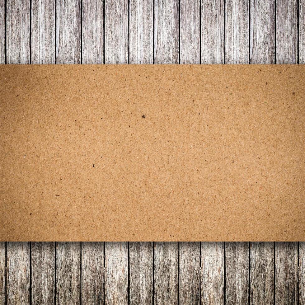Old wood and paper torn with space for text photo