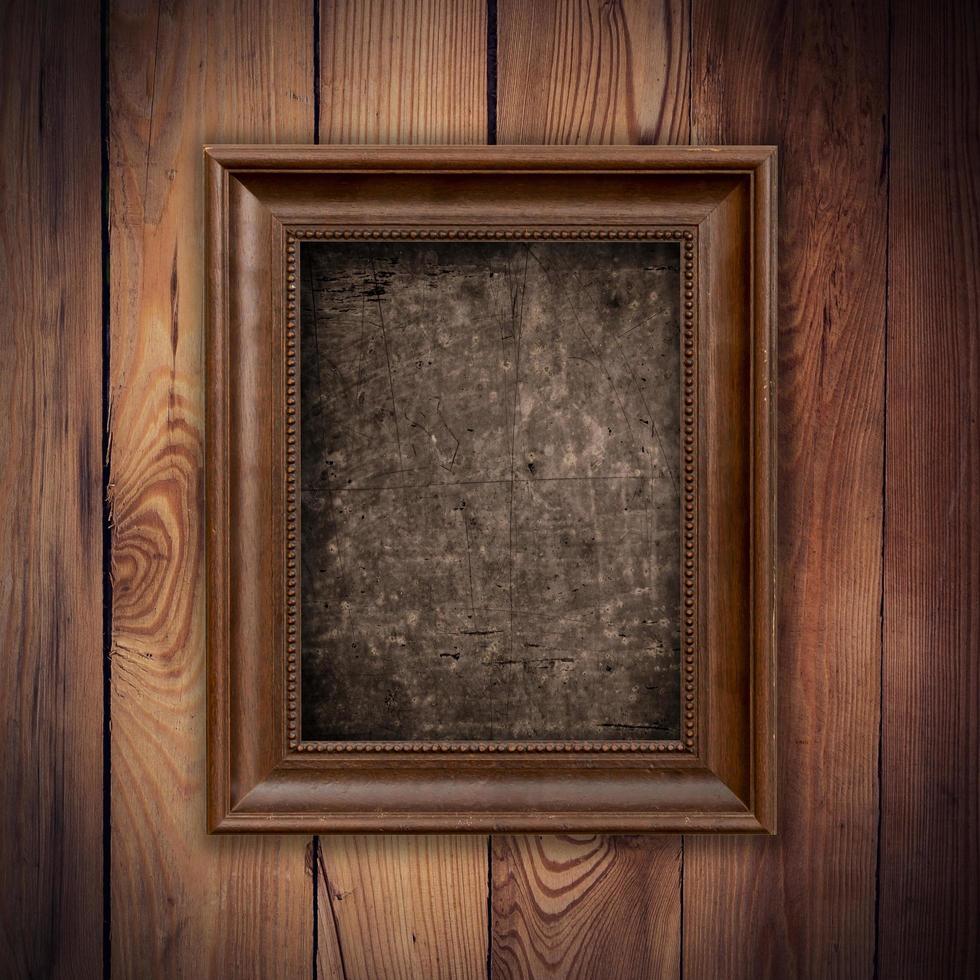 Frame picture vintage with grunge on wood background and texture photo