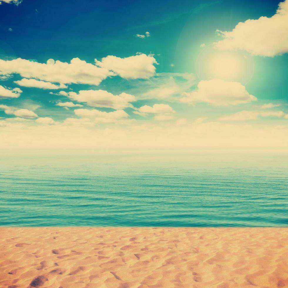 Vintage Beach and sand with white clouds blue sky photo