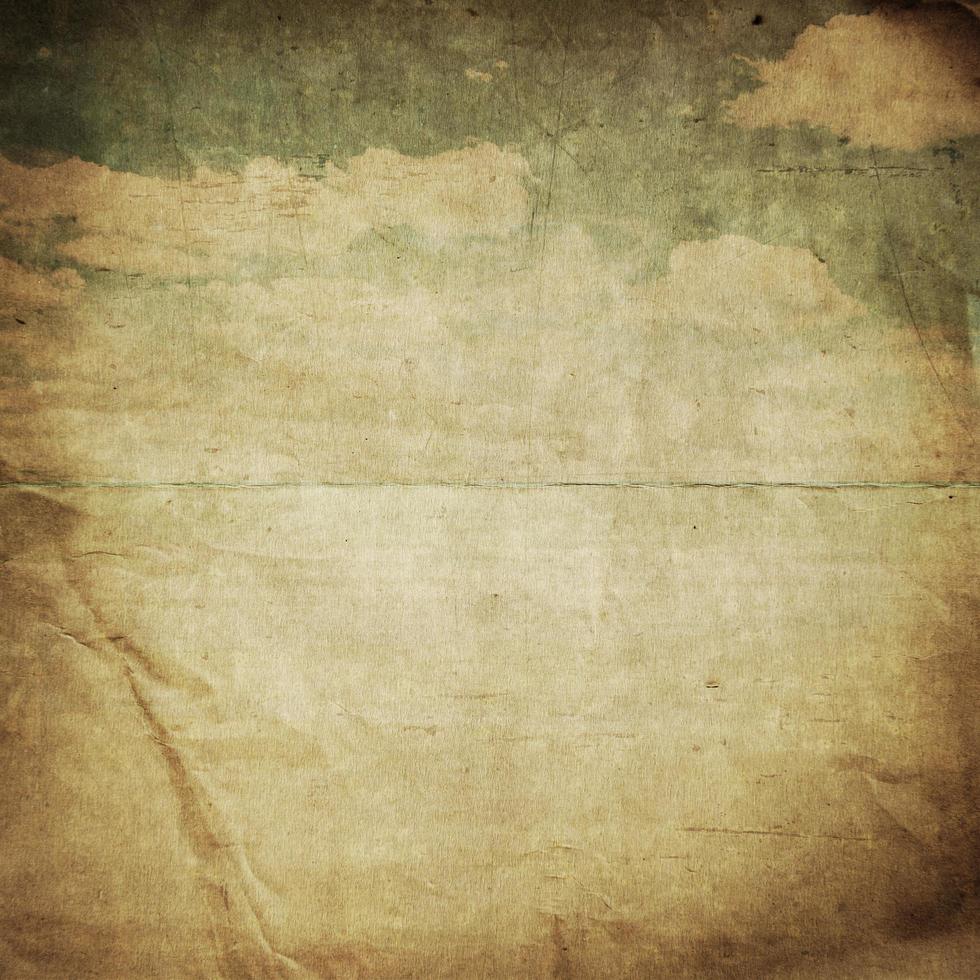 old paper background with delicate grunge texture and blue sky photo