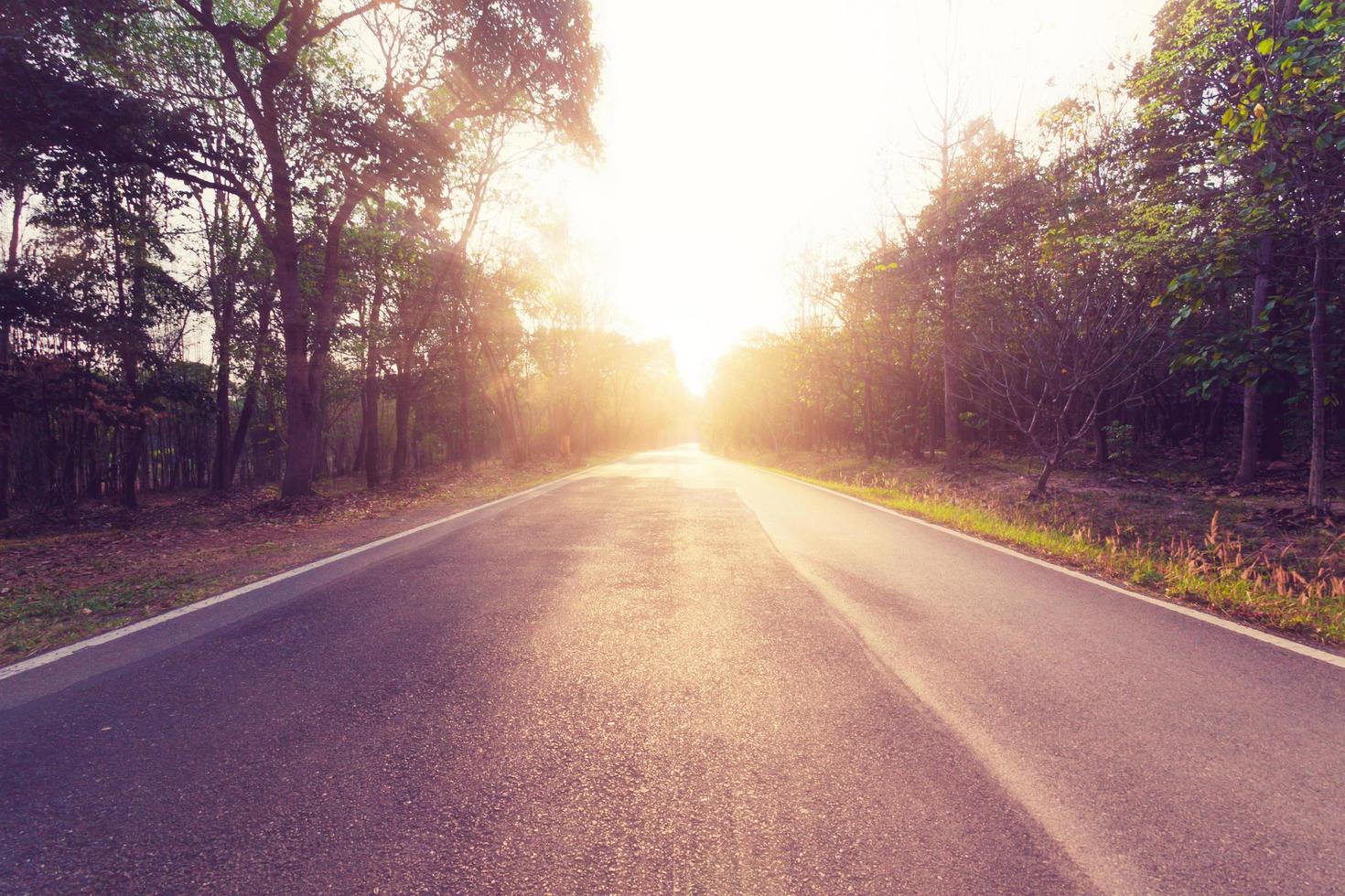 empty asphalt road and sunset photo