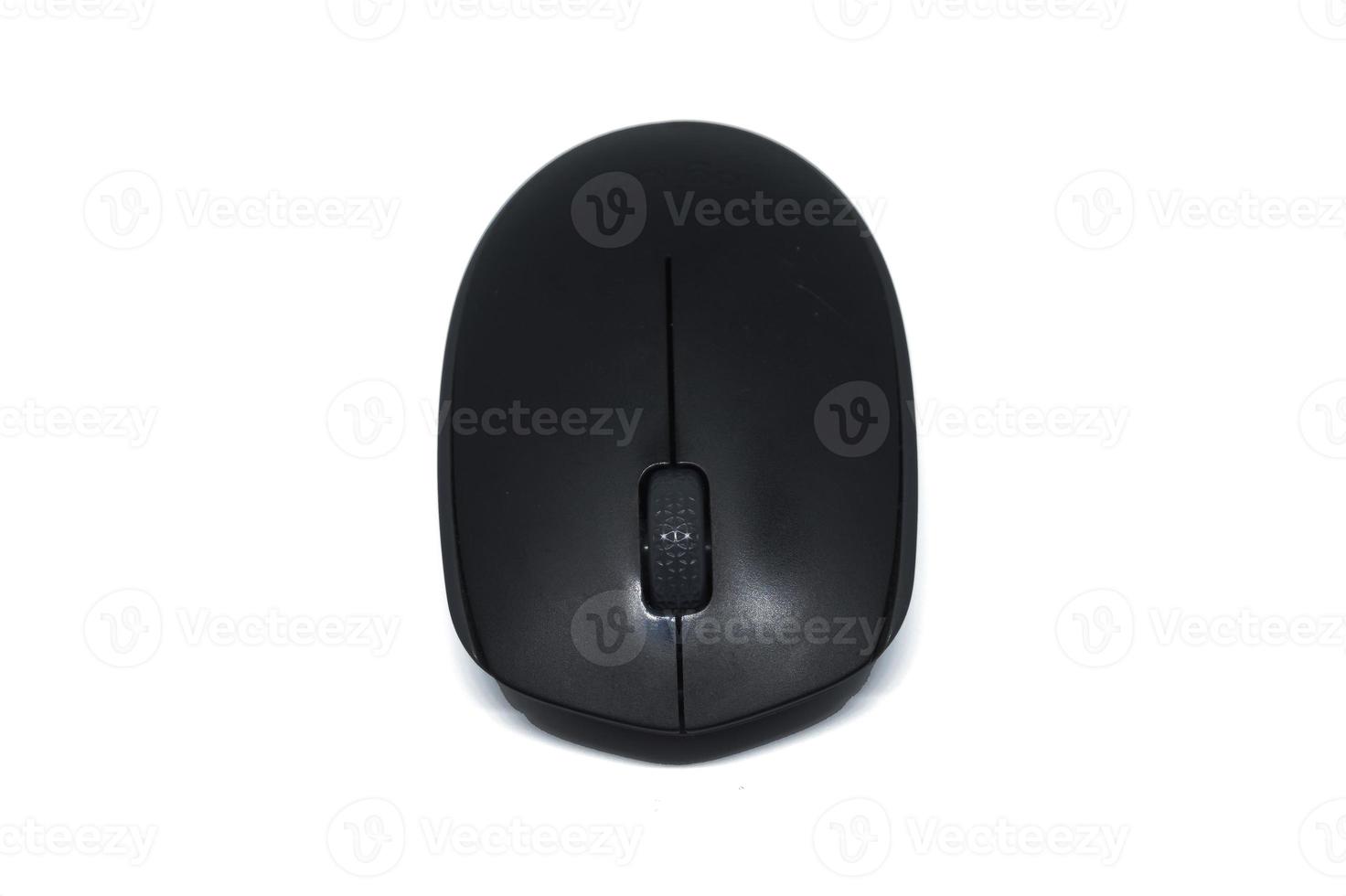 Black wireless computer mouse isolated on white background. Computer hardware. Front view. photo