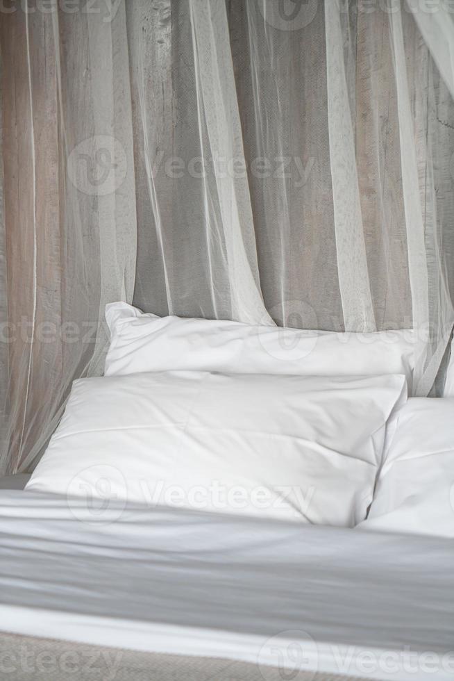white comfortable pillows on bed photo
