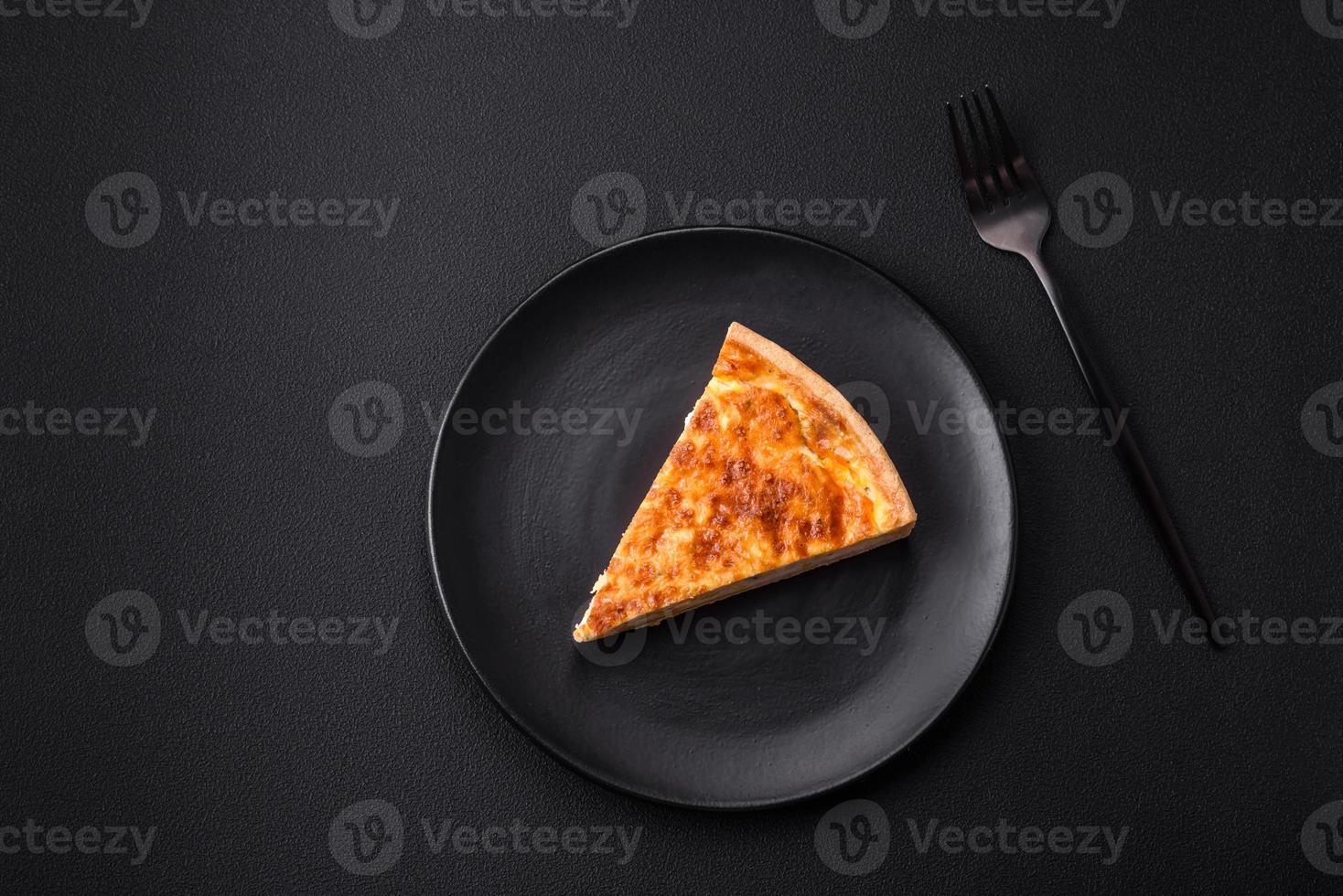 Beautiful delicious quiche pie with four types of cheese with spices and herbs photo
