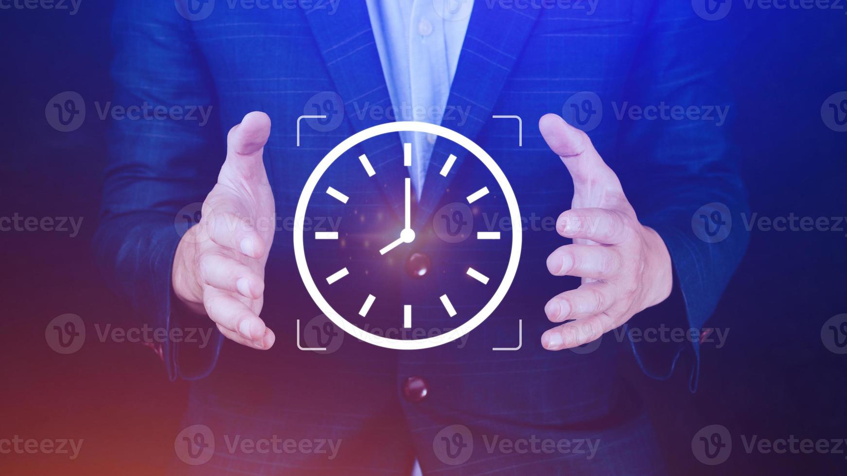 Businessman holding clock digital interface with icon, Business time management, Business time management and business plans concepts, idea and concept of the schedule of the daily routine photo