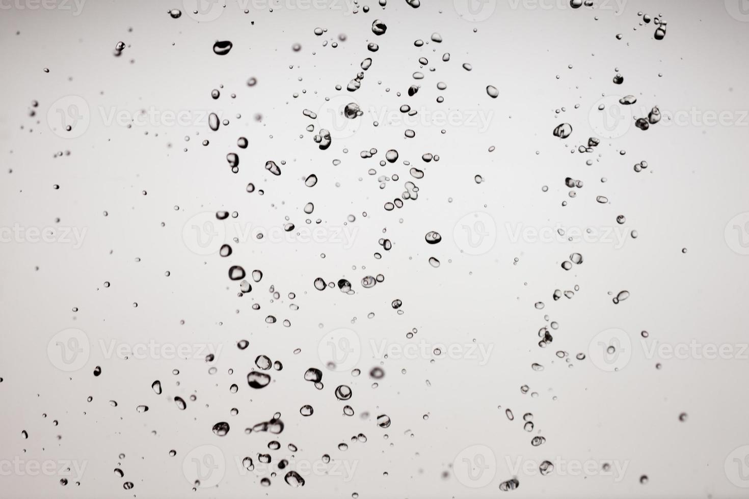 Falling water on a white background photo