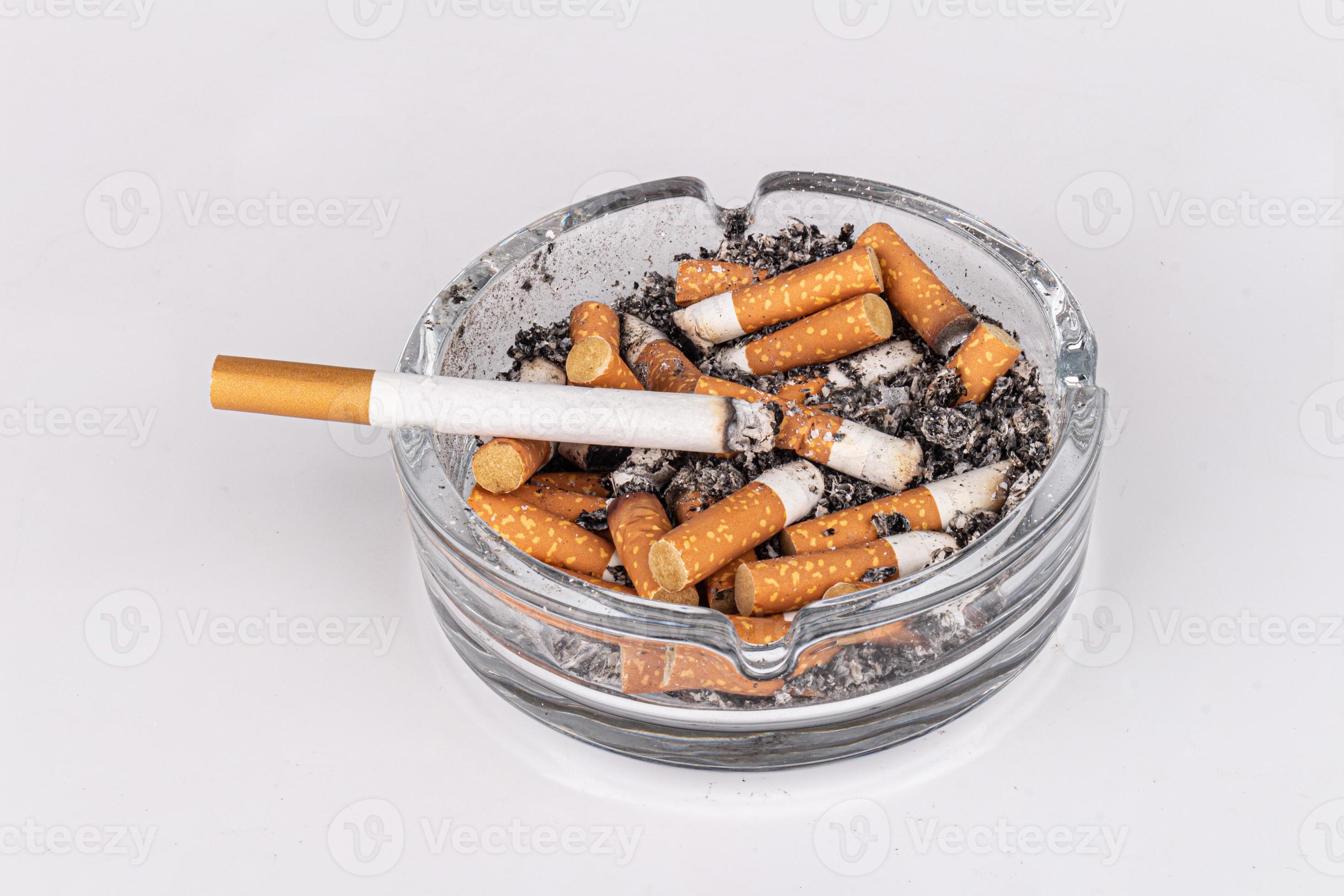 cigarette ashtray white background ash smoke butt 19894773 Stock Photo