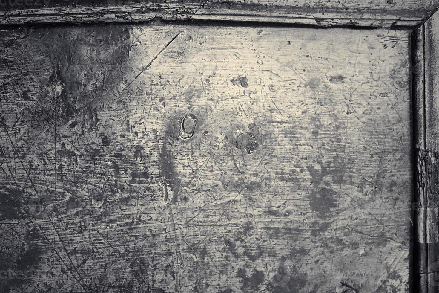 Wooden surface showing planks and grain textures in high resolution. photo