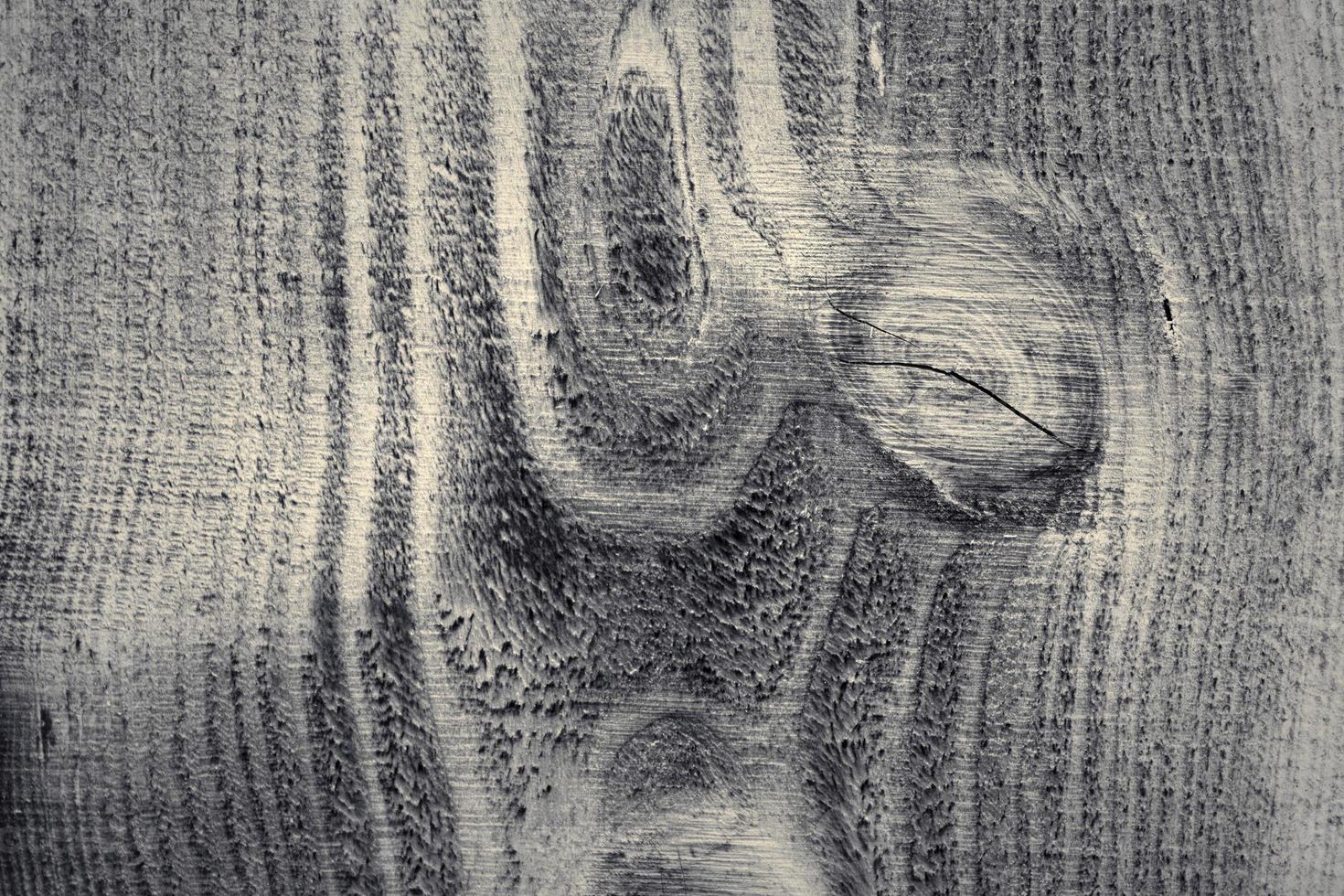 Wooden surface showing planks and grain textures in high resolution. photo
