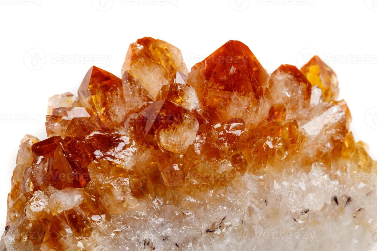 Macro mineral stone Citrine in rock in crystals on a white background photo