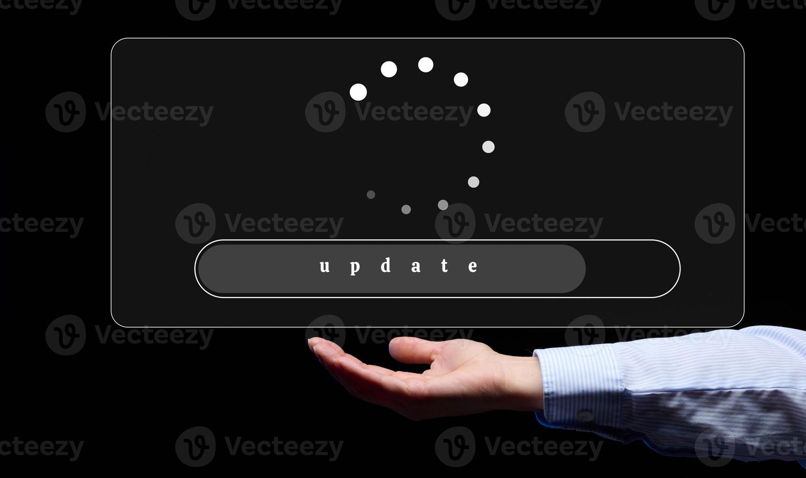 the process of updating the program, site. Starting up a new business and a woman's hand on a black background photo