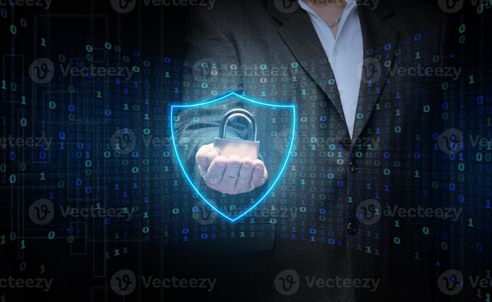 a man with a metal lock stands in front of a virtual screen with a binary code. Data verification, device and network control. Data protection, search for information leakage photo