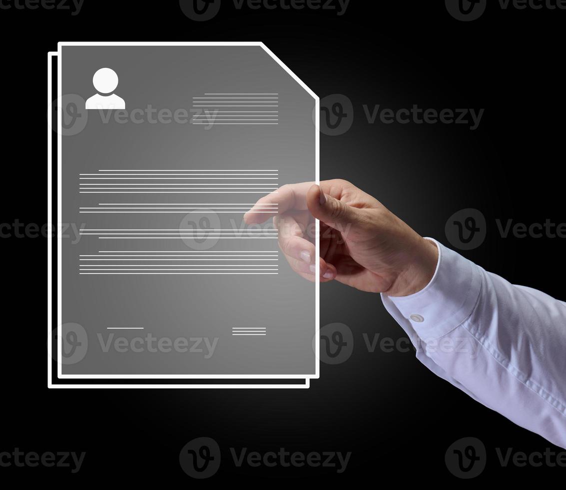 Man's hand holds a virtual resume of a candidate for a position in a company. Search for talented and good employees, promotion photo