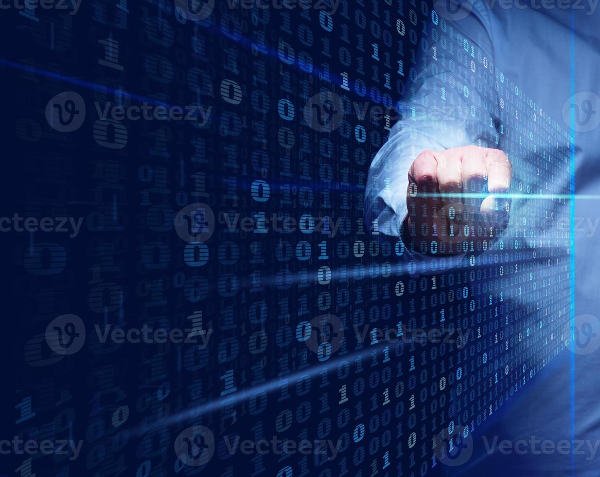 a man stands in front of a virtual screen with a binary code. Data verification, device and network control. Data protection, search for information leakage photo