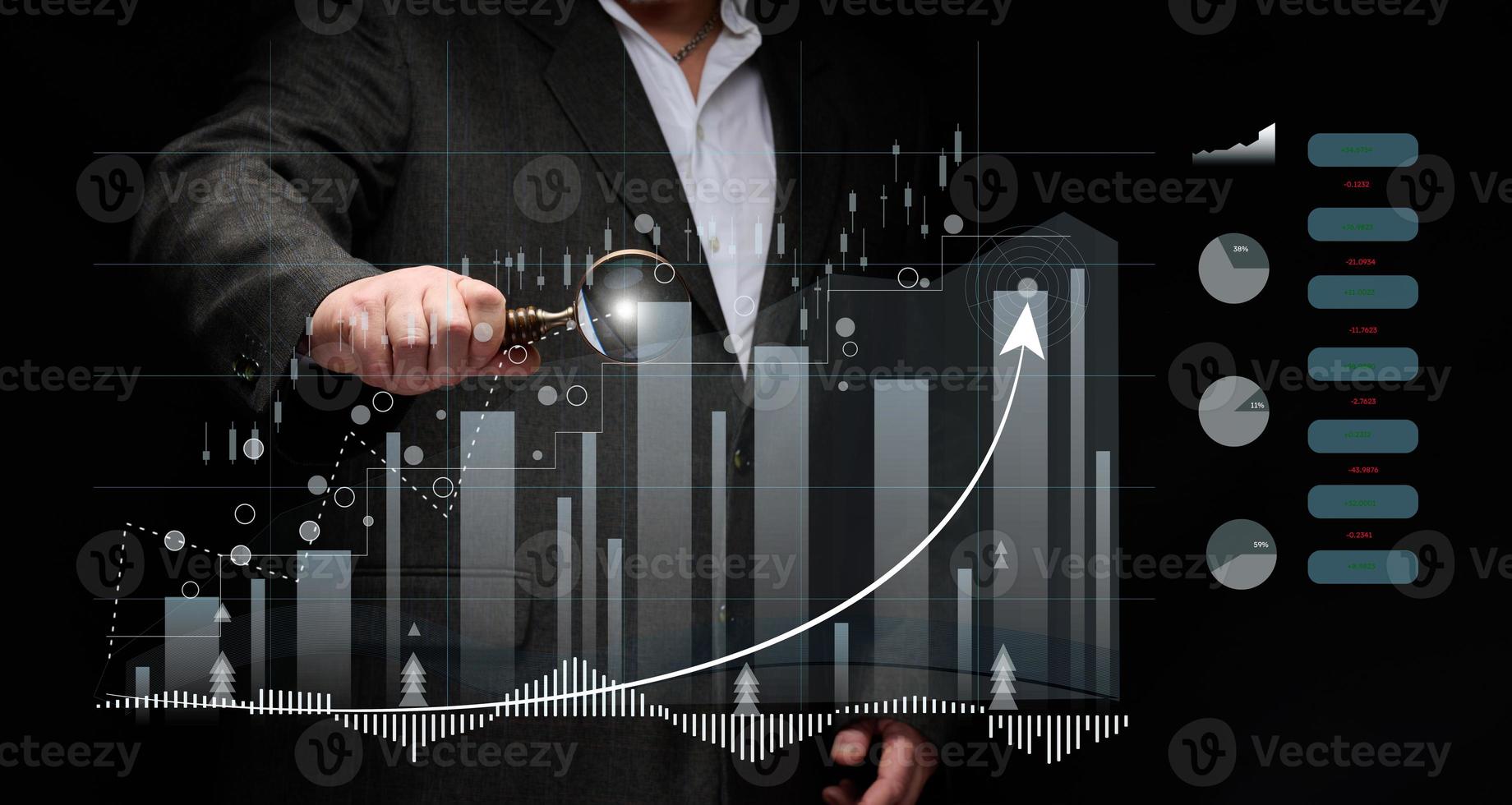 man in a black shirt stands in front of a holographic graph with growing indicators. Business growth, sales increase. High performance photo