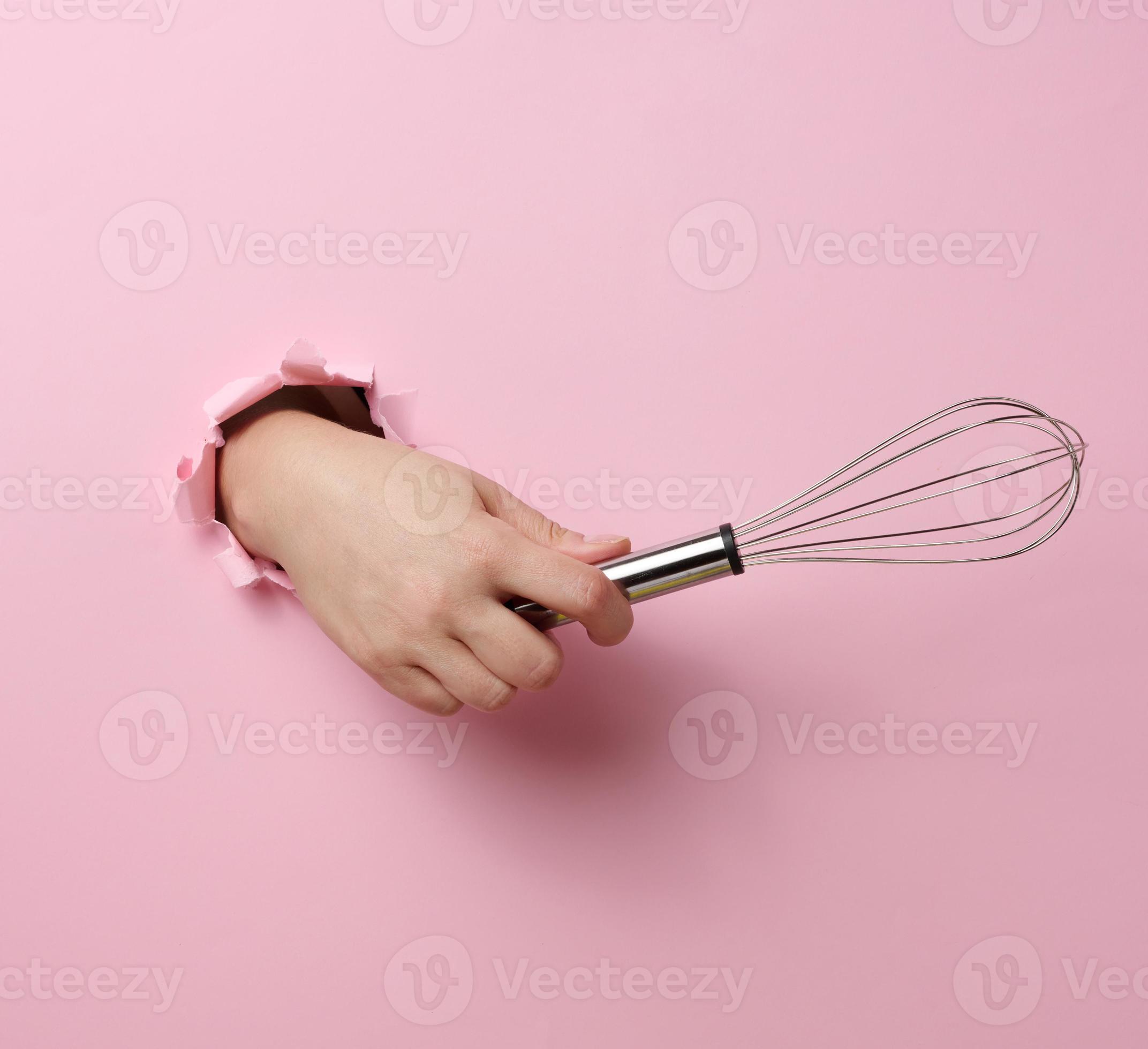 Hand Holding Whisk Photos and Images