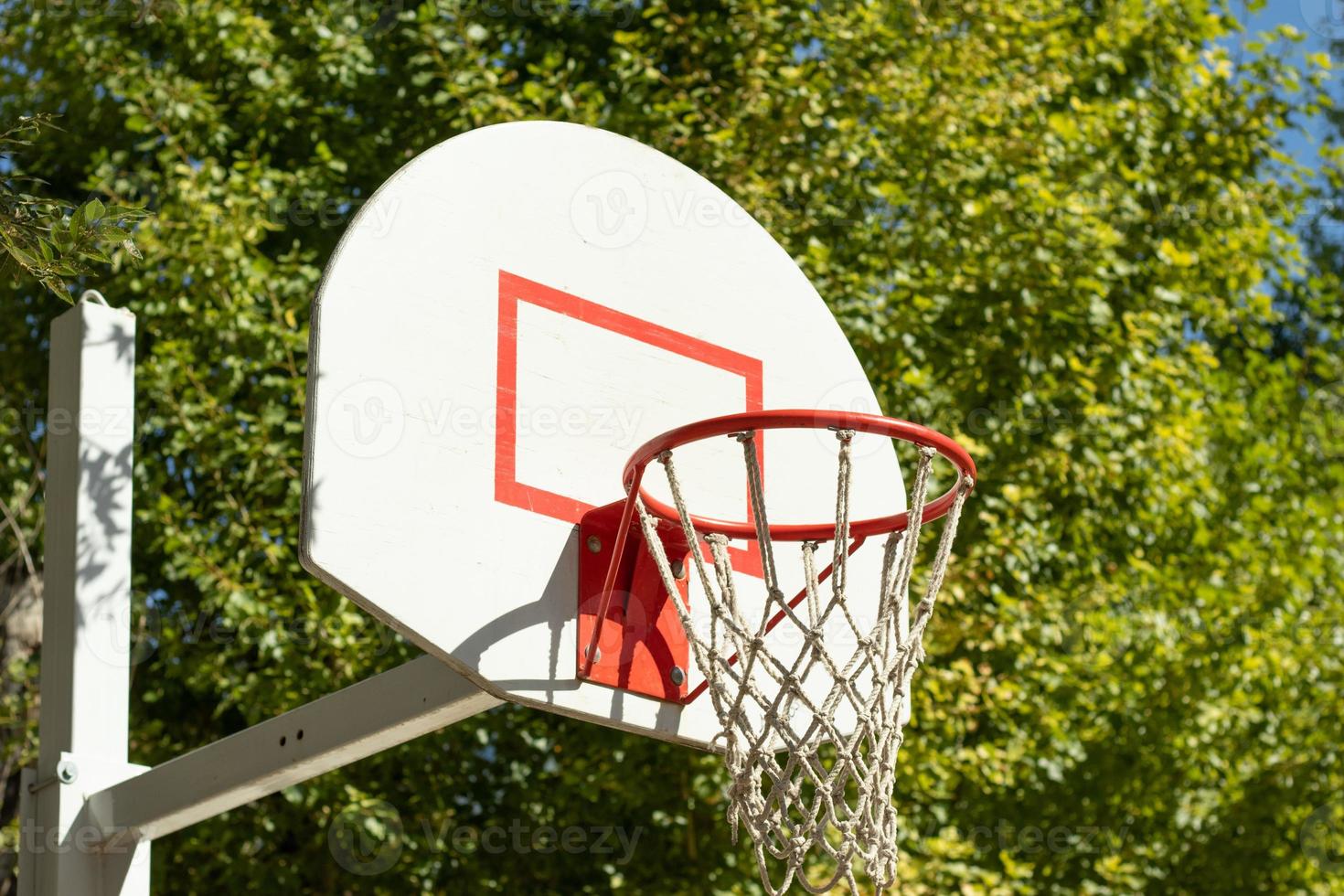 Basketball hoop outdoor activity. Basketball ring photo