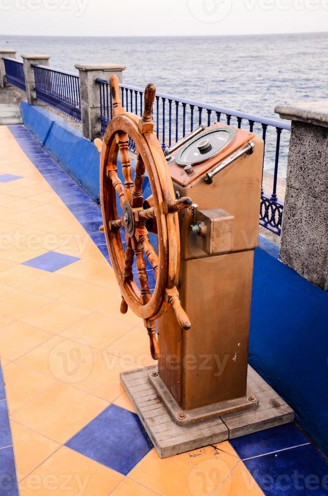 Steering wheel on the coast photo