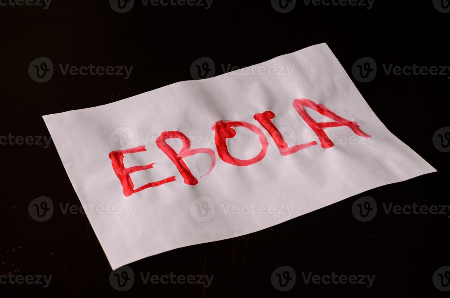 Ebola sign on black background photo