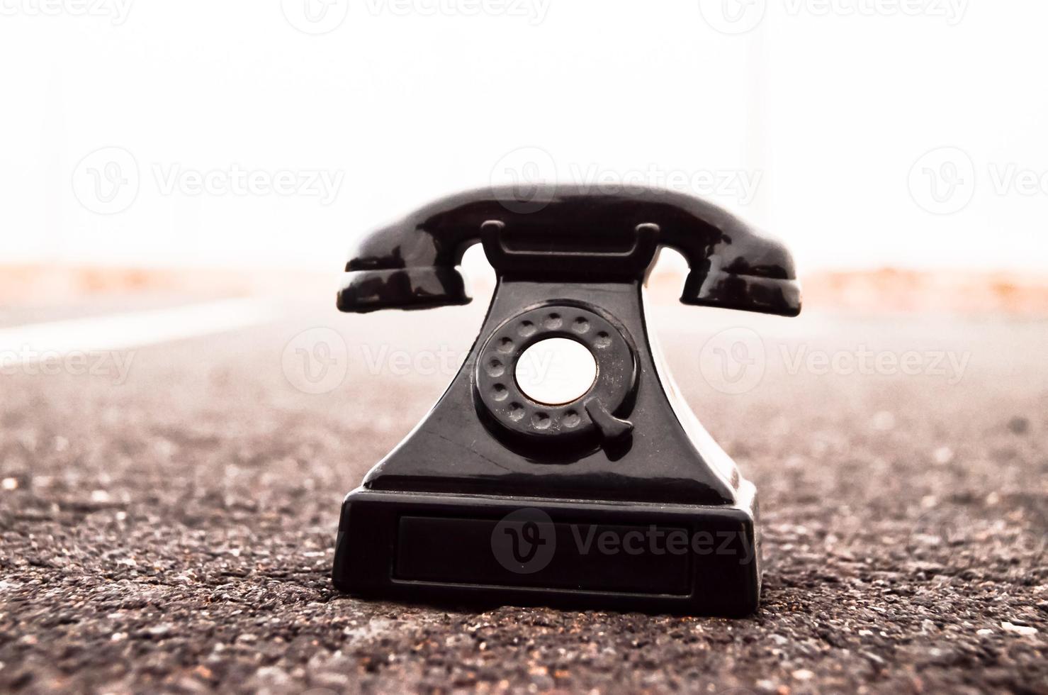 Antique black telephone photo