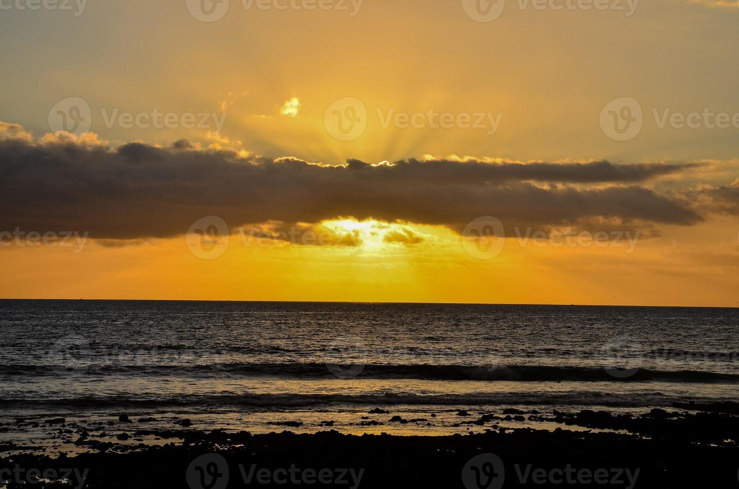 Sunset over the sea photo